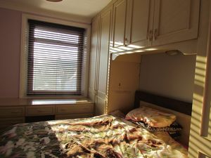 Bedroom One- click for photo gallery